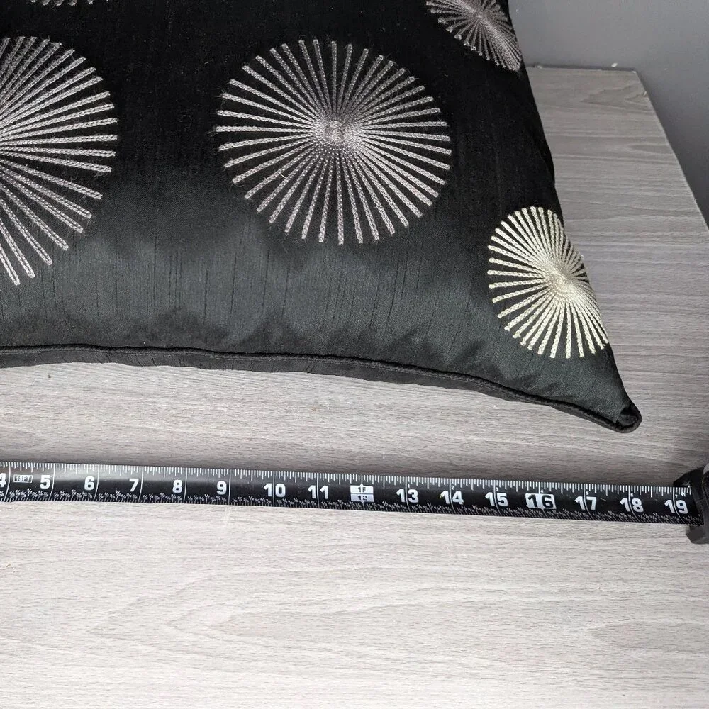 Chic Starburst Accent Pillow in Black and Cream